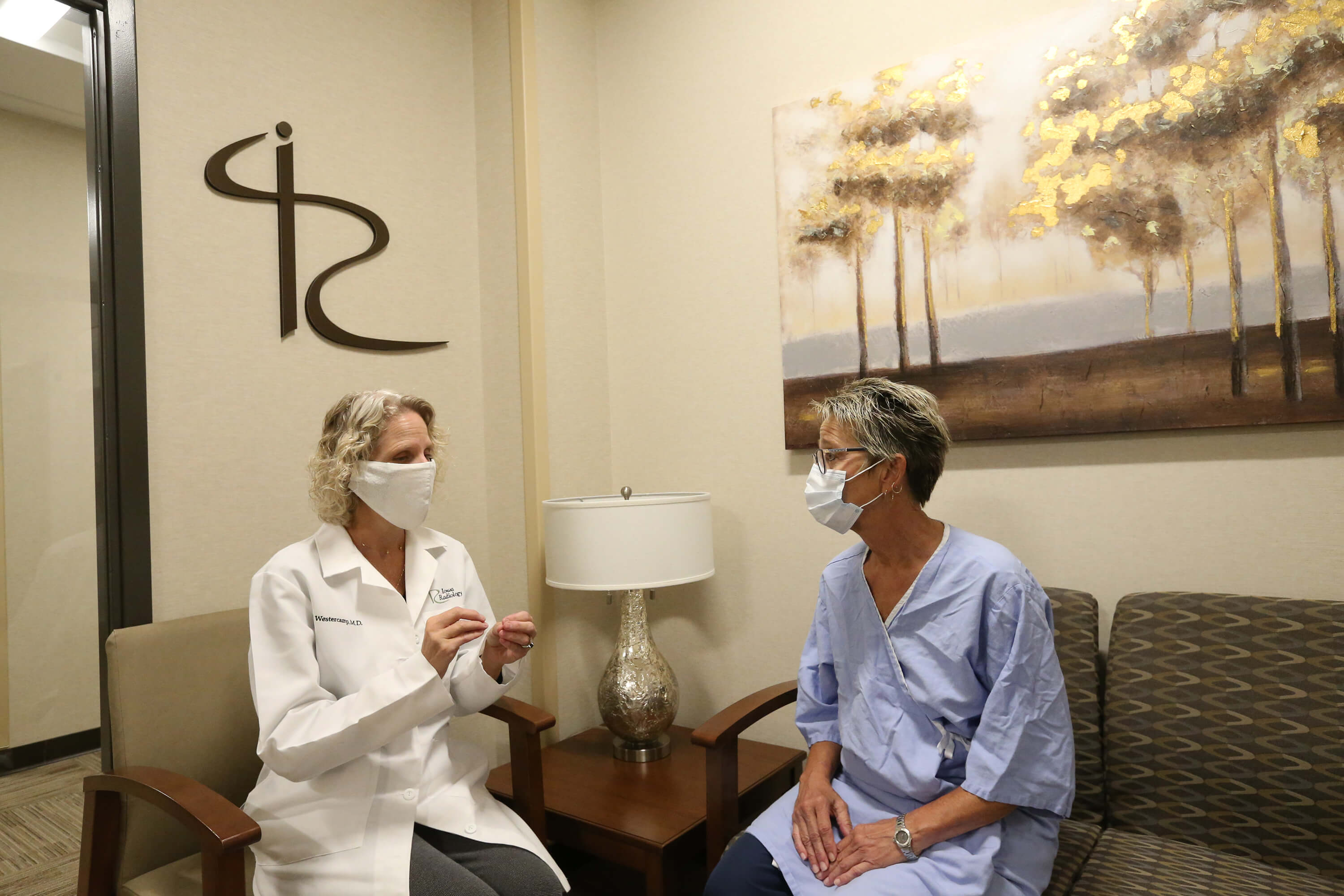 doctor-discussing-treatment-with-patient