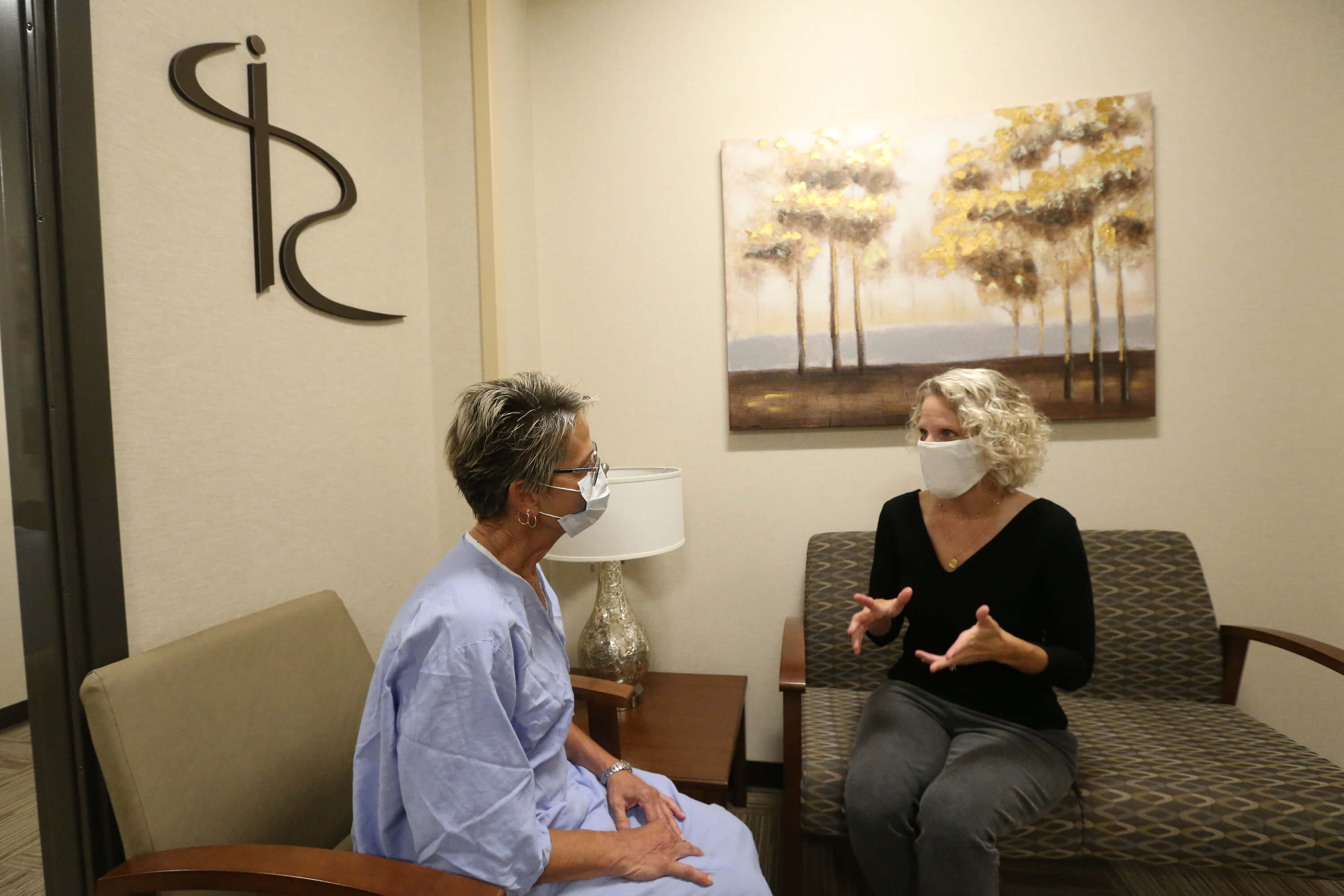 Sonohysterogram doctor-speaking-with-patient